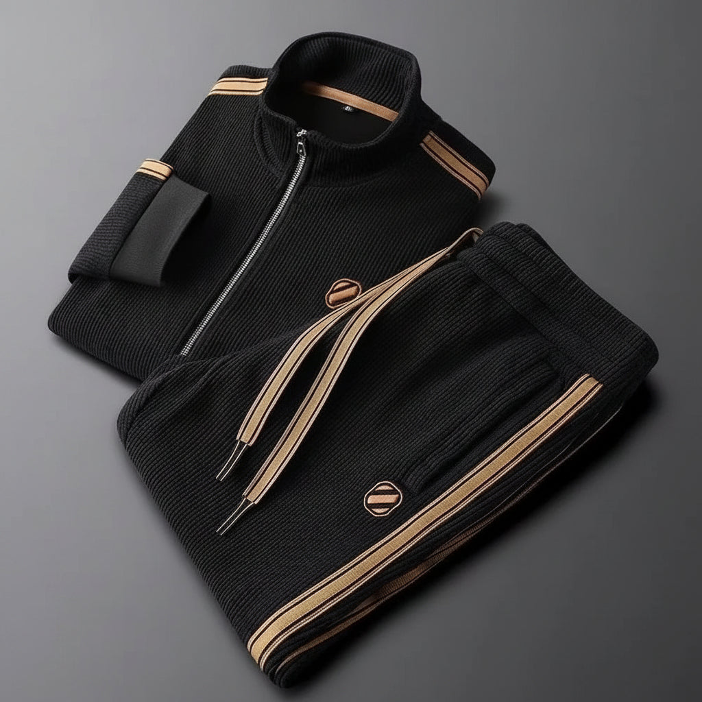 Black jacket with gold accents on a gray background